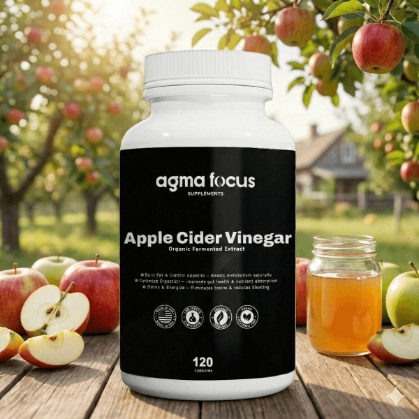 Bottle of agma focus Apple Cider Vinegar with a background of apples and an apple tree.