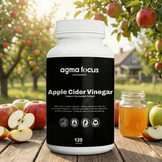 Bottle of agma focus Apple Cider Vinegar with a background of apples and an apple tree.